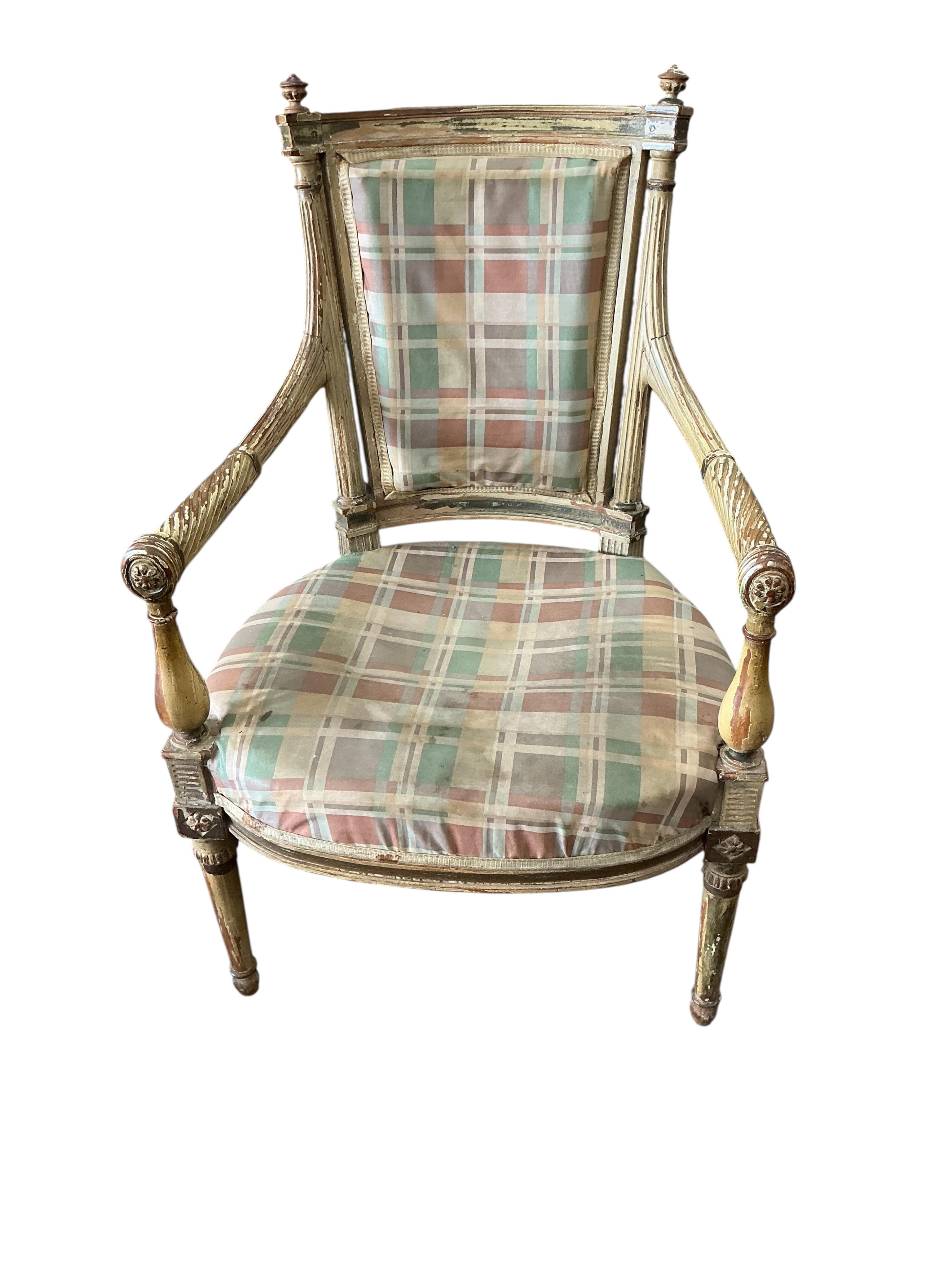 A Louis XVI style cream painted and parcel gilt open armchair, width 55cm, depth 60cm, height 90cm